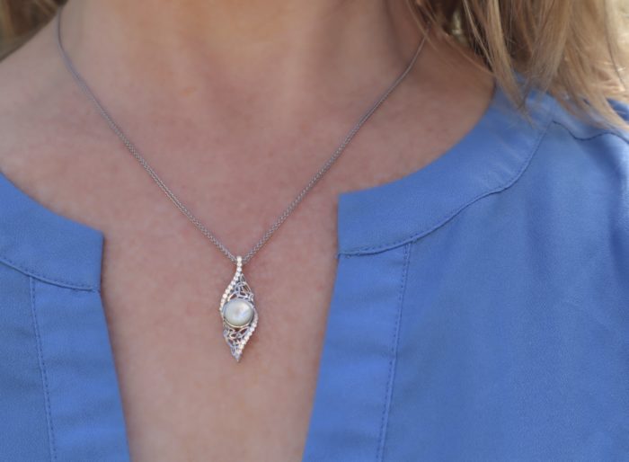 Arian Mother of Pearl twisted Trinity pendant.  made in Ireland.  Scottish Treasures Celtic Corner