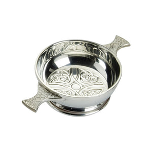 Celtic Cross inlayed in the bottom of this 4 inch quaich made from 100% lead free pewter.  Celtic Corner