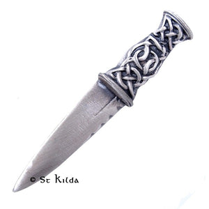 Traditional kilt pin in the style of a dirk with interlaced knotwork on the handle.  Made in Scotland from lead free pewter.  Scottish Treasures Celtic Corner