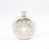 Round flask with celtic knots engraved on front.  Pewter; made in England