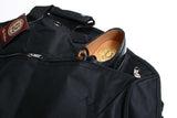 View of pocket to hold shoes in garment bag.  