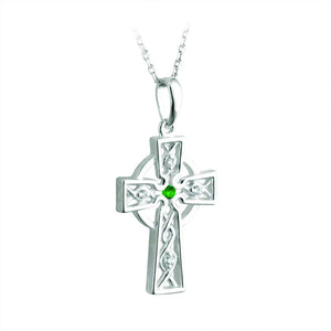 celtic cross pendant with green cz in center.  Sterling silver; made in Ireland