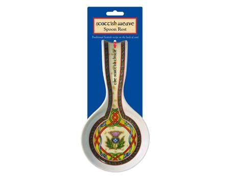 Scottish weave ceramic spoon rest with thistle design in center.